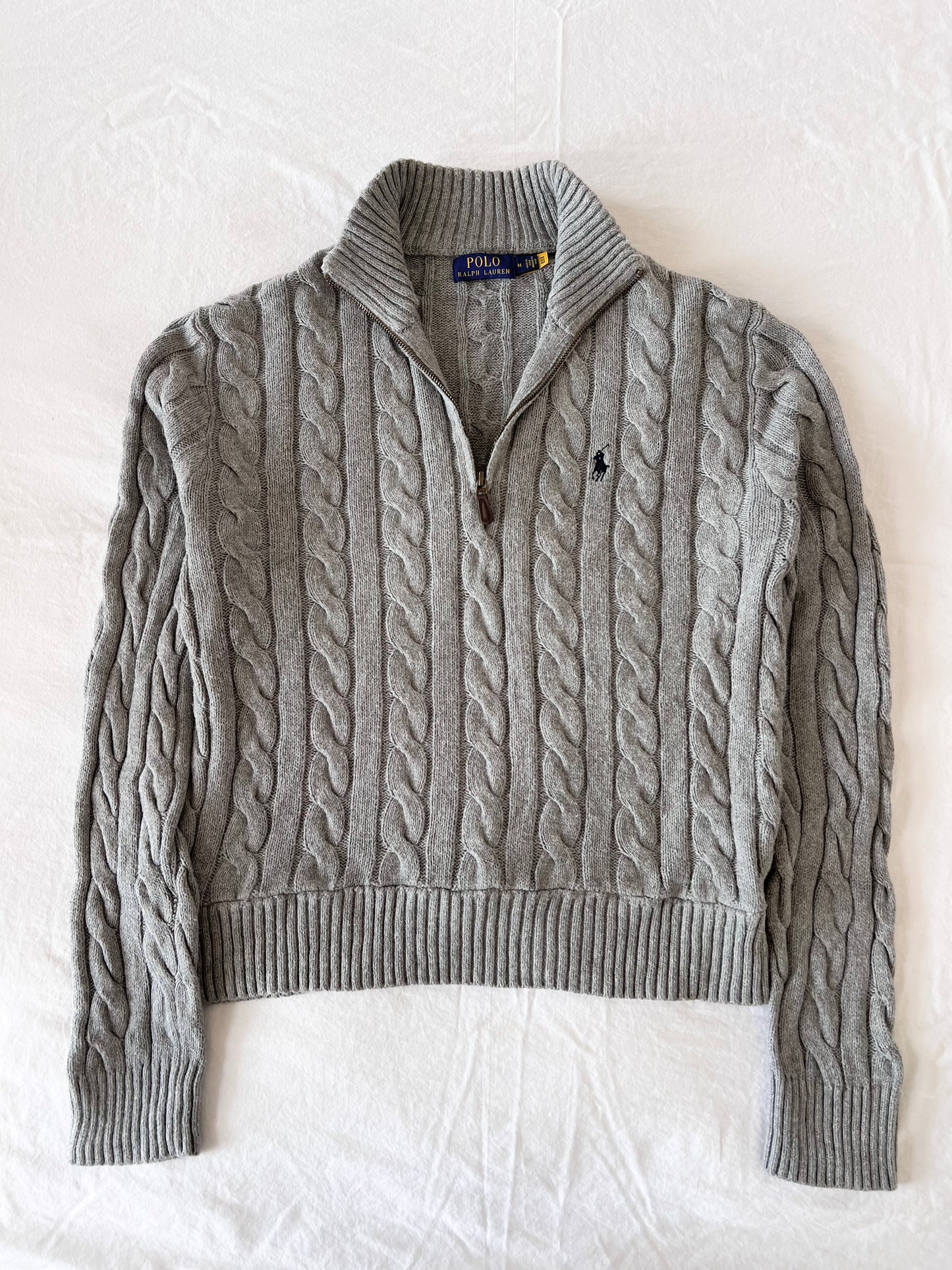Gray half-zip cable knit sweater