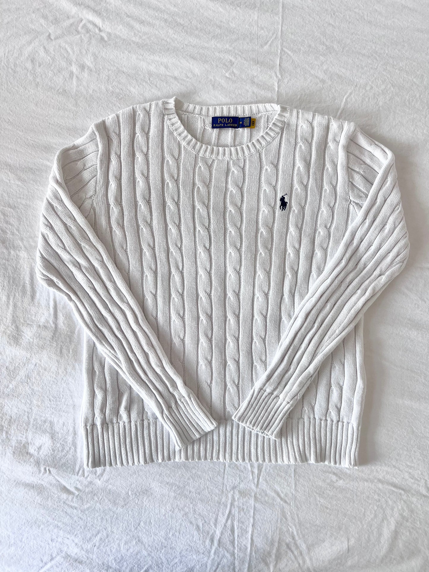 White cable knit sweater