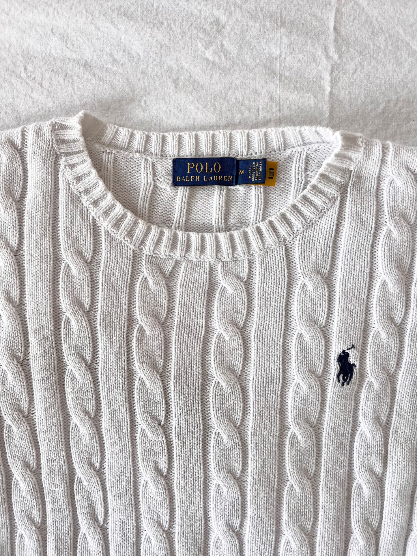 White cable knit sweater