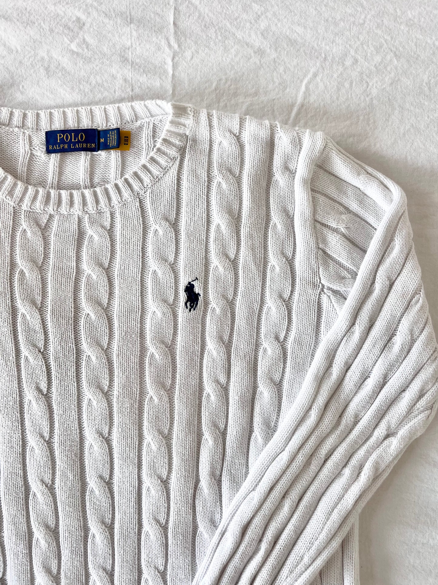 White cable knit sweater