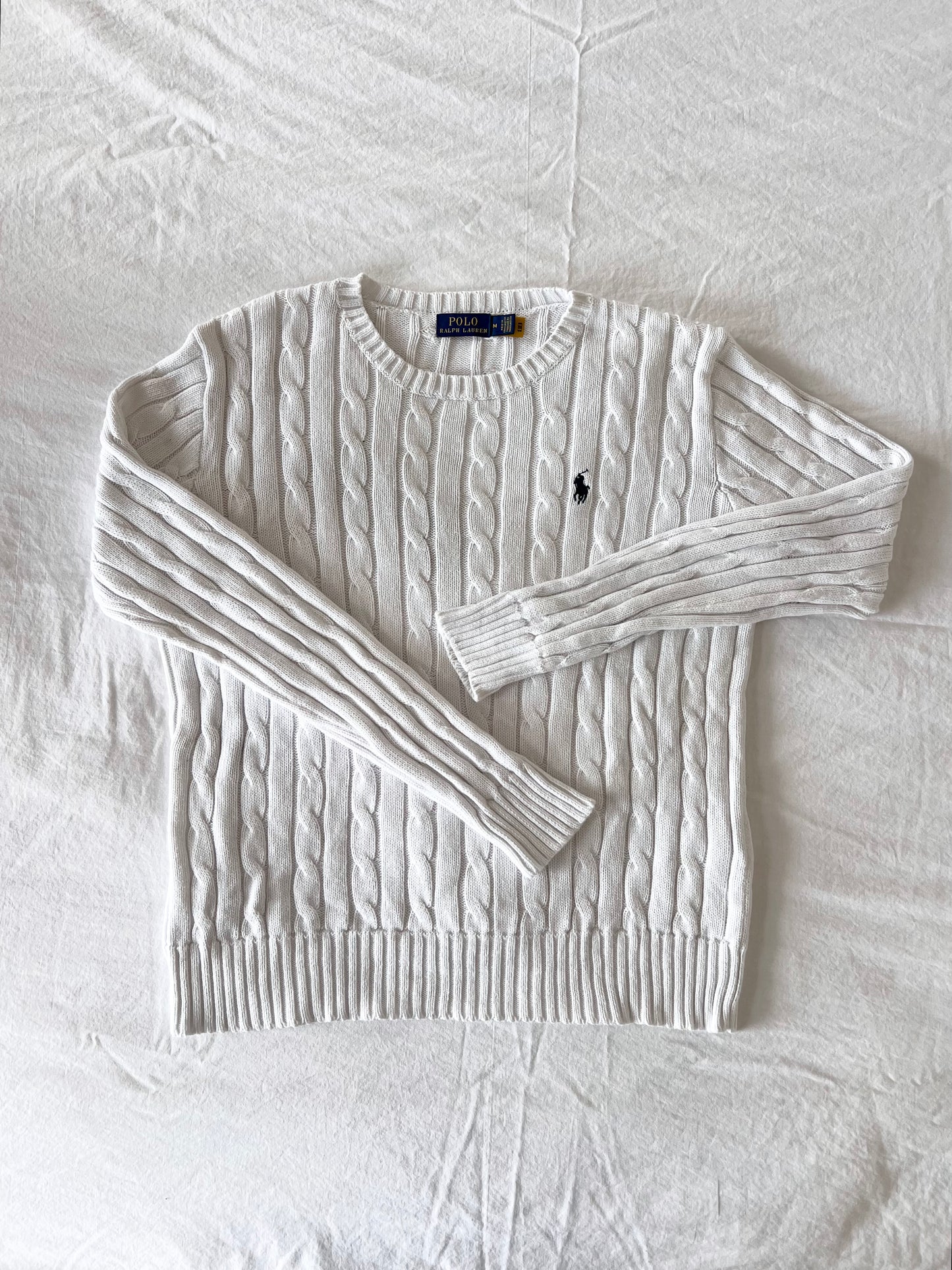 White cable knit sweater