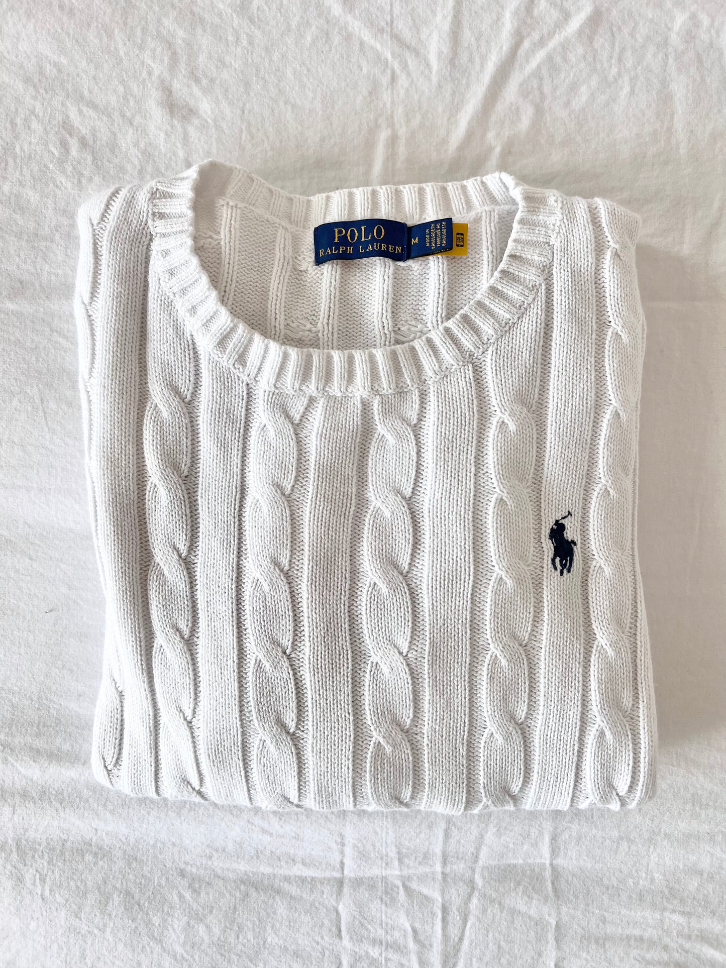 White cable knit sweater