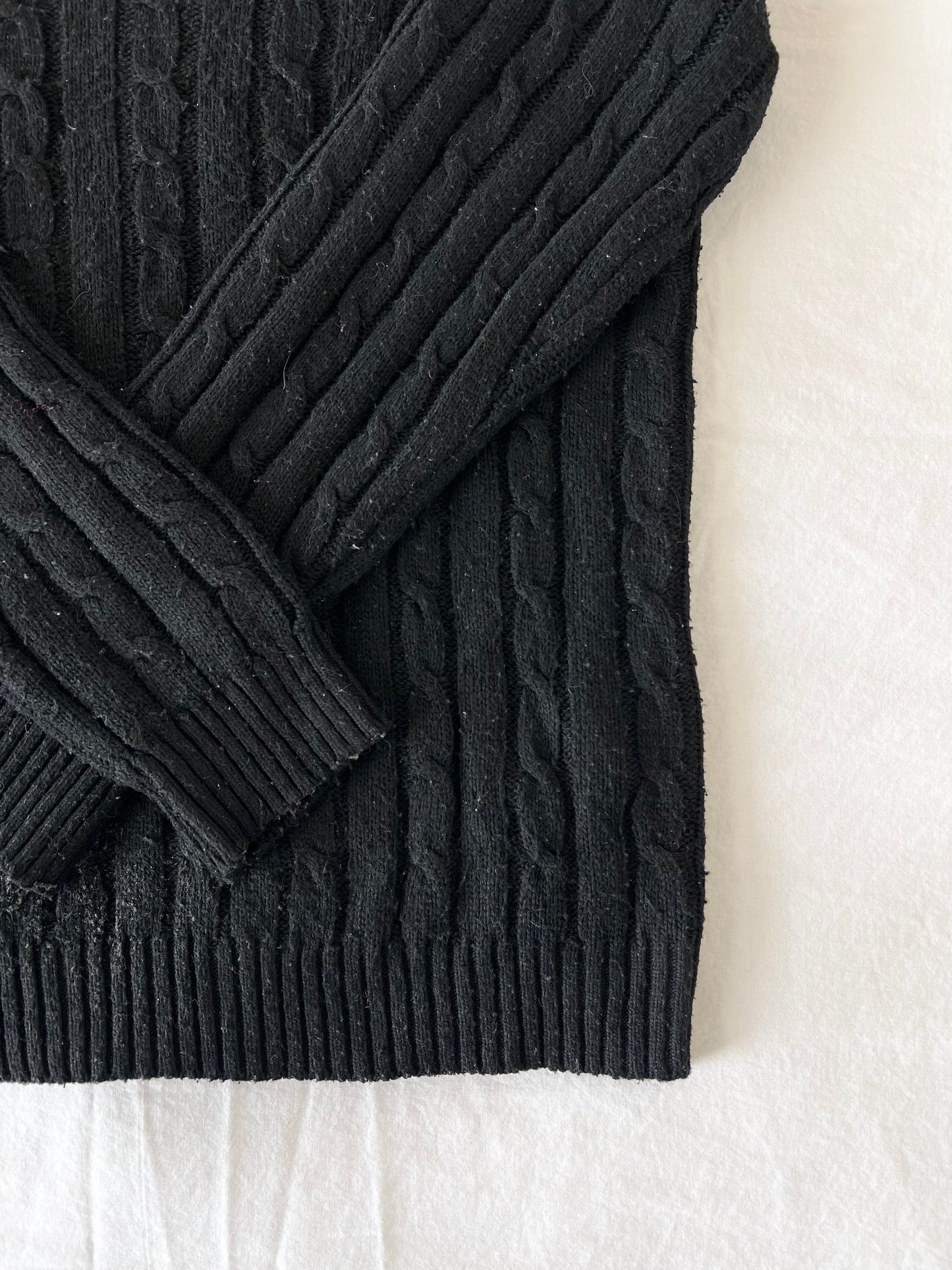 Black cable knit sweater