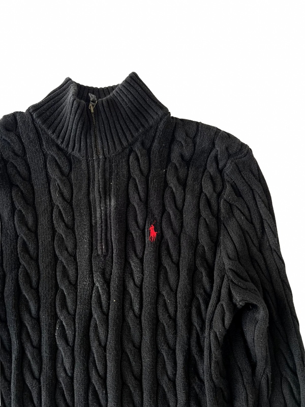 ‏Black half-zip sweater